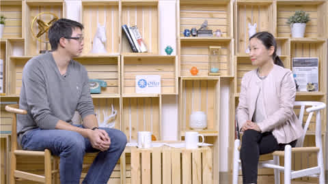 Two people discussing data analysis problems